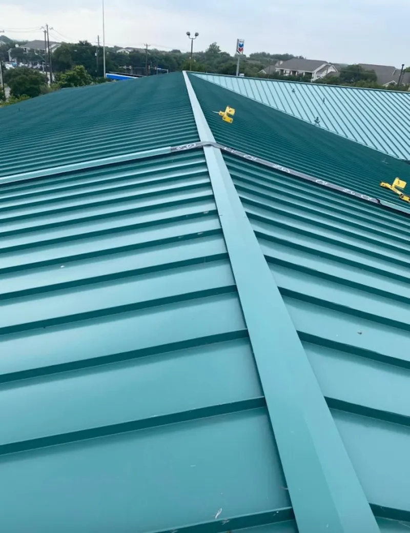 Green commercial metal roof ridge and valley for Metal Roof Repair in Meraux